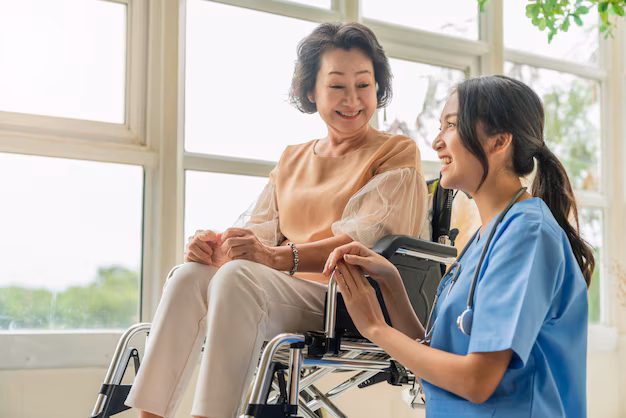 Smiling Professional Caregiver Assisting Elderly Woman